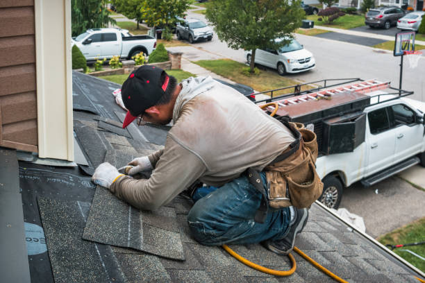 Professional Roofing technician working in Revloc, PA